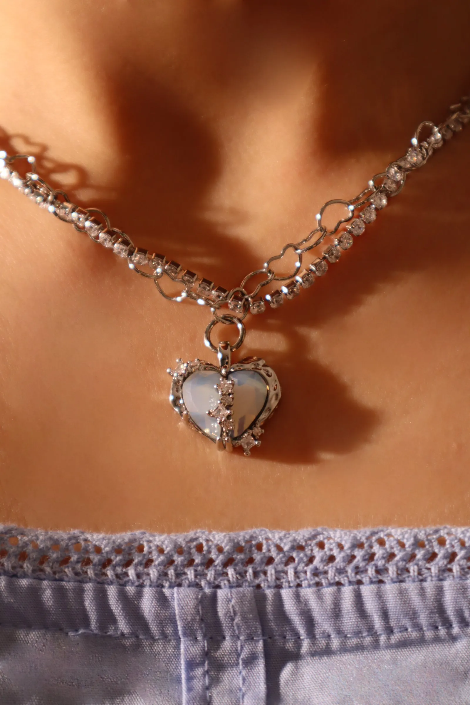Platinum Plated Blue Opal Heart necklace