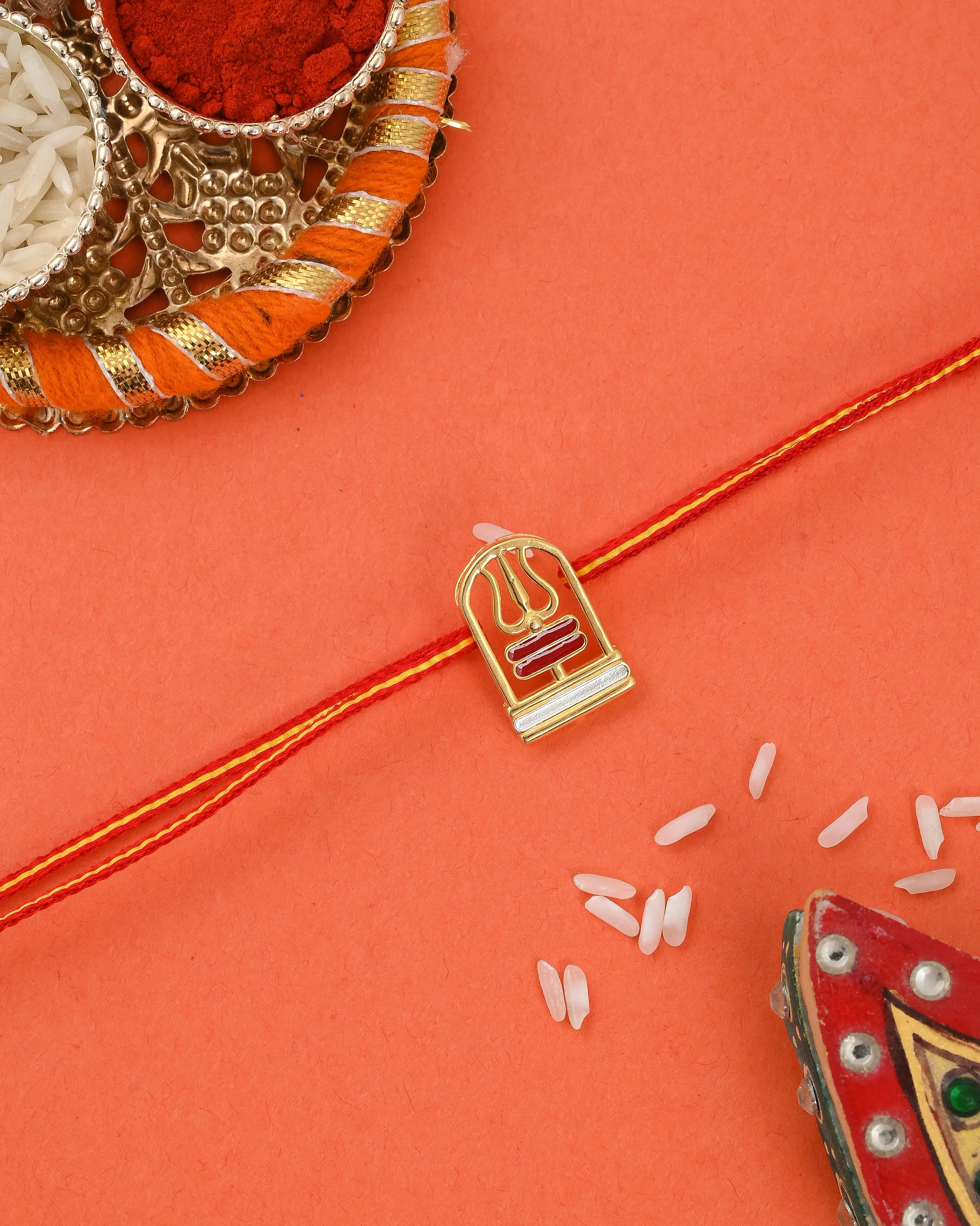 Silver with 22 kt gold Shiv trishul Silver rakhi for brother. 3-In-1 Silver rakhi /bracelet/pendant for Men and women with Roli chawal set.